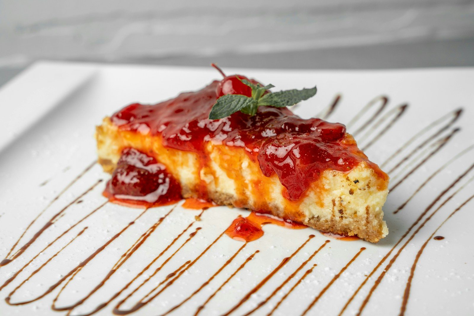 a piece of cheesecake on a white plate